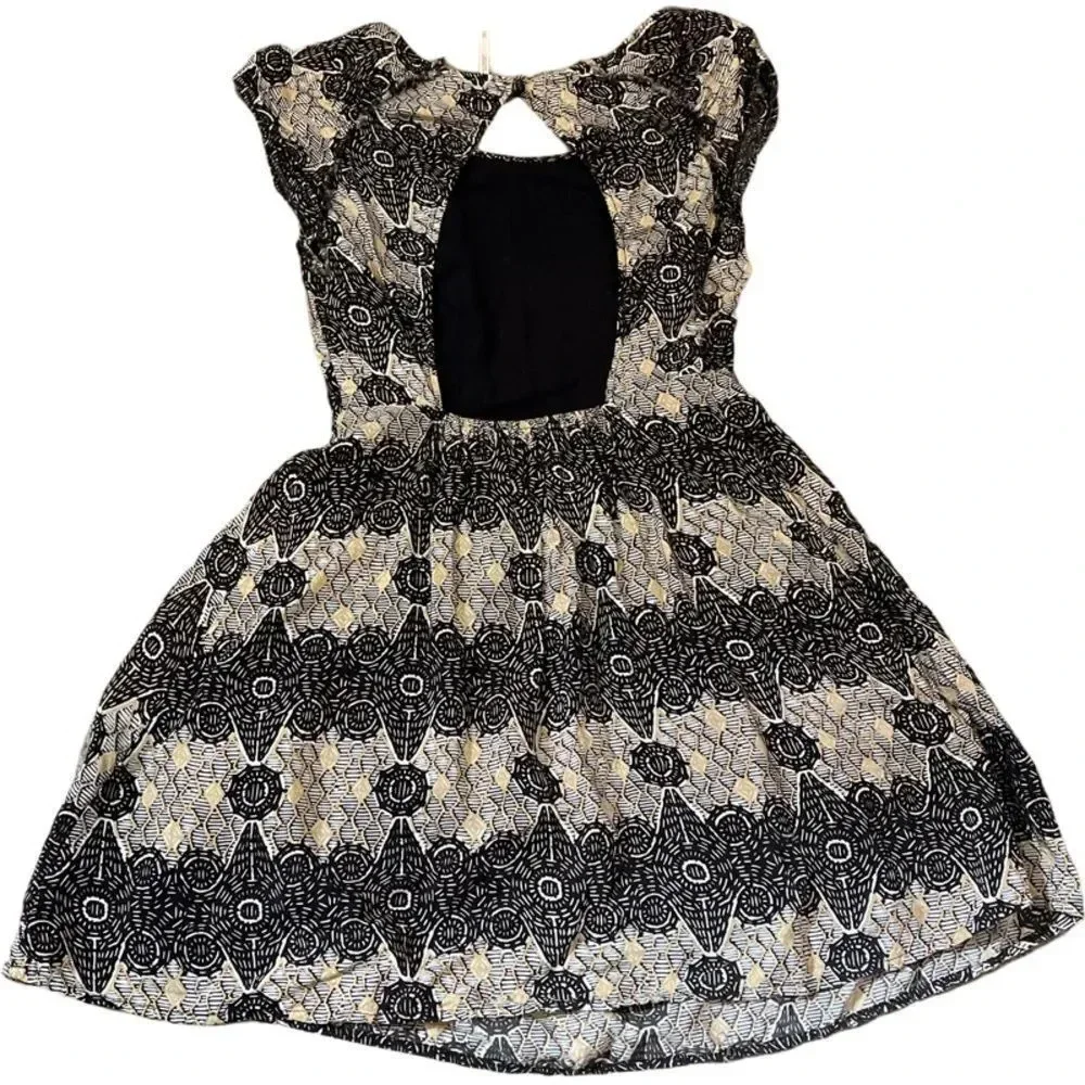 EUC Free People Large Key Hole back XS